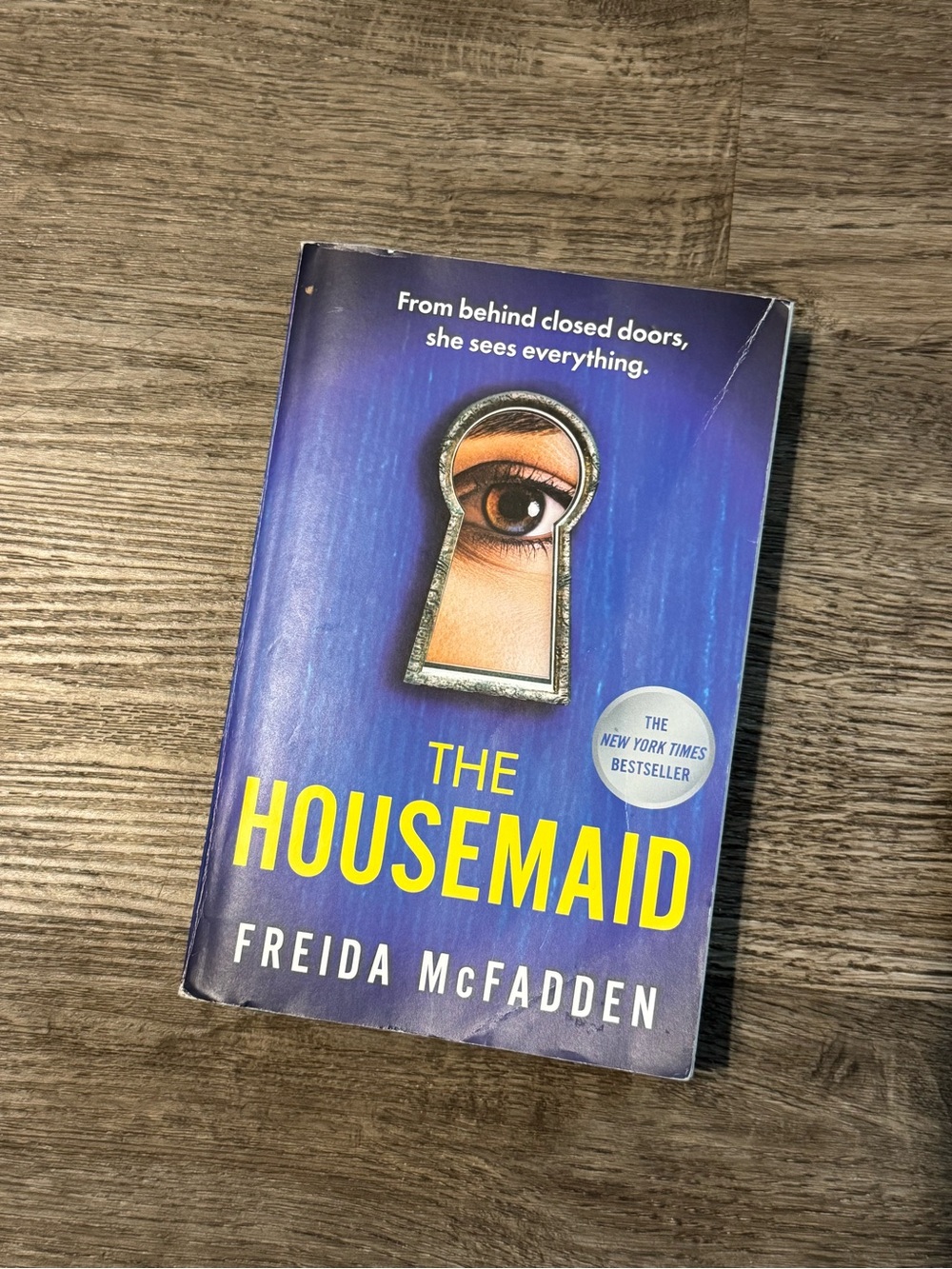 The Housemaid by Freida McFadden — Blue & Yellow Paperback